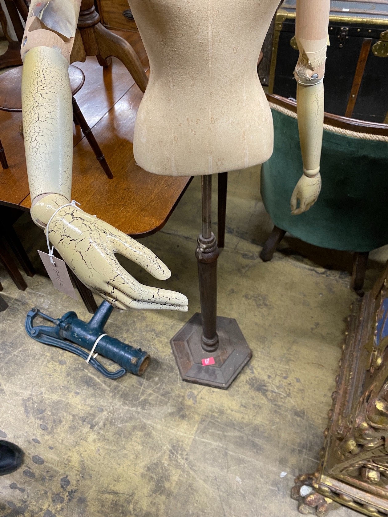 A Victorian style canvas beech and composition mannequin on telescopic stand